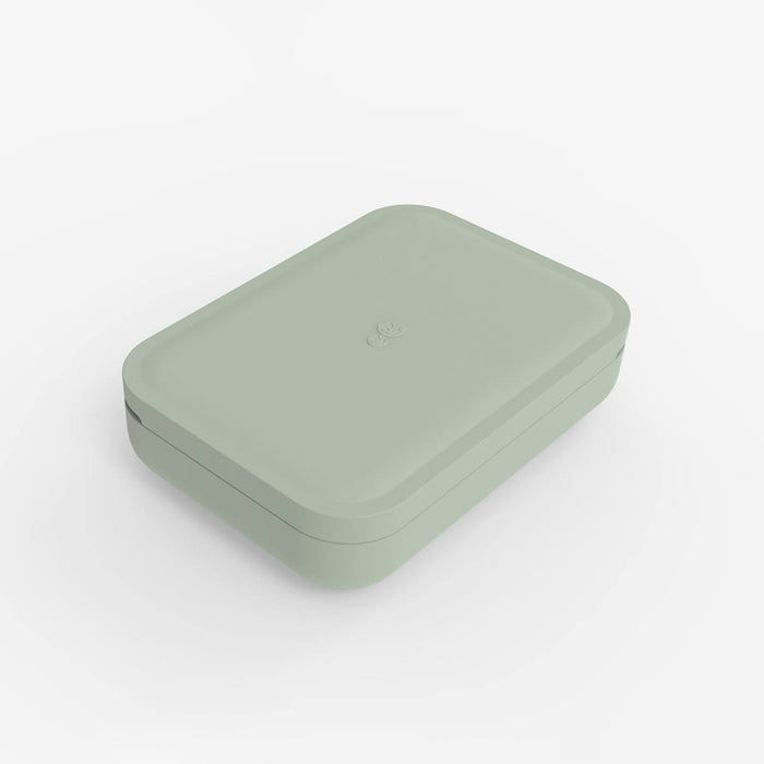 ezpz travel box in sage green is an all-in-one feeding + storage system that helps families pack, transport, and serve baby’s meals when away from home #color_sage