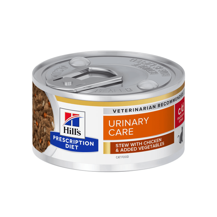 Hills Prescription cat food tin with a bowl full of food pictured on the label, text reads 'Urinary Care, C/D Multicare Stress' and 'Stew with chicken & added vegetables' on a white background.