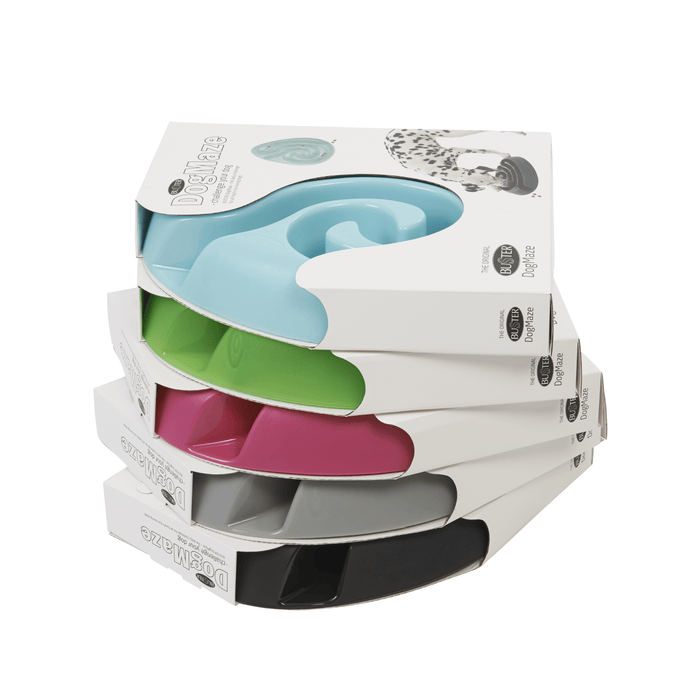White background with a pile of 5 Kruuse BUSTER DogMaze Large in cardboard packaging, and in 5 different colours: light blue, green, pink, grey and black.