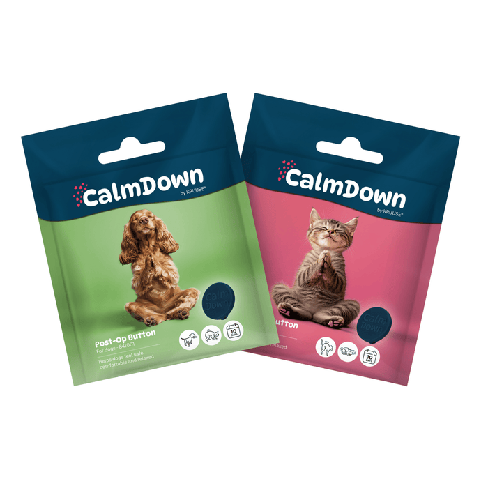 Two packages of CalmDown products for dogs and cats on a white background